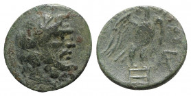 Uncertain mint, c. 3rd-2nd century BC. Æ (21mm, 7.06g, 2h). Laureate head of Zeus r. R/ […]OY, Eagle standing r. on altar, head l., wings spread. Gree...