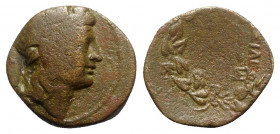Uncertain, c. 3rd-2nd century BC. Æ (20mm, 6.80g, 3h). Diademed(?) head r. R/ Legend within laurel-wreath. Good Fine