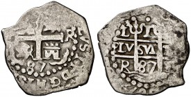 1687. Carlos II. Lima. R. 1 real. (Cal. 674). 2,60 g. Triple fecha. Parte del nombre del rey y del ordinal visible. Buen ejemplar. MBC.