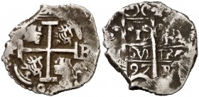 1697. Carlos II. Potosí. F. 1 real. (Cal. 737). 2,95 g. Doble fecha, una parcial. Manchitas. Rara. (MBC-).