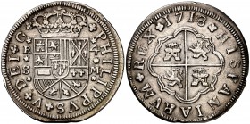 1718. Felipe V. Sevilla. M. 4 reales. (Cal. 1143). 11,45 g. Dos flores de lis en las armas de Borgoña. Golpes en el dígito 8. (MBC+).