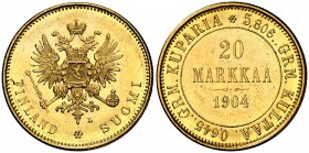 1904. Finlandia. Nicolás II. L. 20 marcos. (Fr. 3) (Kr. 9.2). 6,43 g. AU. Bella. Brillo original. S/C-.