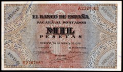 1938. Burgos. 1000 pesetas. (Ed. D35). 20 de mayo, serie A. Leve doblez y pequeños pliegues en una esquina, pero buen ejemplar. Raro y más así. (EBC-)...