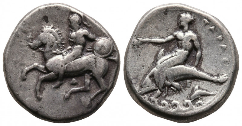 Calabria.Tarentum. Circa 272-235 BC. AR Nomos (20,9mm, 7.8g.) Obv: Helmeted, nak...