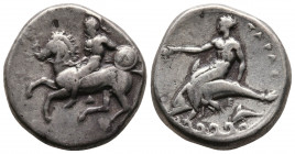 Calabria.Tarentum. Circa 272-235 BC. AR Nomos (20,9mm, 7.8g.) Obv: Helmeted, naked rider on horse galloping left, holding round shield on left arm, re...