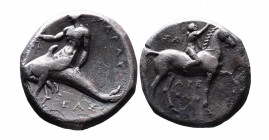 Ancient Greek AR didrachm Tarent, Triskeles with human legs over lion prowling to left, all within incuse square. Above E___E__ (blurred), uncertain l...