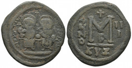 Justin II 565-578 AD, AE follis, Cyzicus Mint, 567/568 AD
DNIVSTNI-...PPSAC..., Justin II, on left, and Sophia, on right, seated facing on double thro...