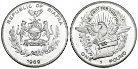 Biafra. 1 pound. 1969. (Km-6). Ag. 25,12 g. lightly rubbed. Rare. Almost MS. Est...100,00. 

Spanish Description Biafra. 1 pound. 1969. (Km-6). Ag. ...