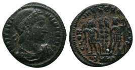 Constantine I (307/310-337). Æ Follis . Heraclea, 330-3. Rosette-diademed, draped and cuirassed bust r. R/ Two soldiers flanking two standards; •SMHA....