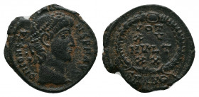Constans AD 337-350. Antioch Follis Æ. D N CONSTANS P F AVG, pearl-diademed head right / VOT XV MVLT XX in four lines within wreath, mintmark: SMANΘ. ...