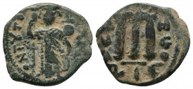 Constans II (641-668), AE follis, issued RY 1 = 641/2. Constantinople, 4.79g, 20-22mm.
Obv: EN T૪TO NIKA; Constans II standing facing, wearing crown s...