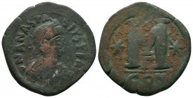 Anastasius I. 491-518. Æ follis . Constantinople mint, 498-518. DN ANASTASIVS PF AVG, pearl-diademed, draped and cuirassed bust right / Large M, cross...