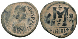 JUSTINIAN I (527-565). Follis. Theoupolis (Antioch).
Obv: D N IVSTINIANVS P P AVG.
Diademed, draped and cuirassed bust right.
Rev: Large M; star to le...