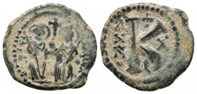Justin II, with Sophia. 565-578. Æ Half Follis . Antioch mint. Justin, on left, and Sophia, on right, seated facing on a double throne, each holding s...