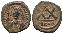 Tiberius II Constantine. 578-582. AE Half Follis. Nicomedia mint, Struck 579-582. Obv.: D m TIb CONSTANT P P AVG, helmeted and cuirassed bust facing, ...