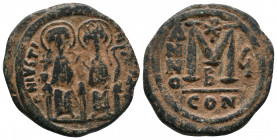 Justin II. 565-578. AE follis . Constantinople mint, regnal year 6 = A.D. 570/1. D N IVSTI - NVS P P AV, Justin, on left and Sophia on right, both nim...