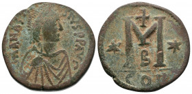 Anastasius I. 491-518. Æ Follis . Constantinople mint, Struck 507-512. Diademed, draped, and cuirassed bust right / Large M; cross above, stars flanki...
