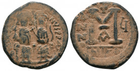 Justin II, with Sophia. 565-578. Æ Follis . Nicomedia mint. . Justin and Sophia, both nimbate, enthroned facing; Justin holding globus cruciger and So...