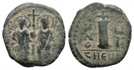Justin II. 565-578. Æ decanummium . Antioch (Theoupolis), Nimbate figures of Justin II and Sophia seated facing on throne, each holding cruciform scep...