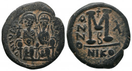 Justin II, with Sophia. 565-578. Æ Follis . Nicomedia mint. Dated RY 10 (574/5). Justin and Sophia, both nimbate, enthroned facing; Justin holding glo...