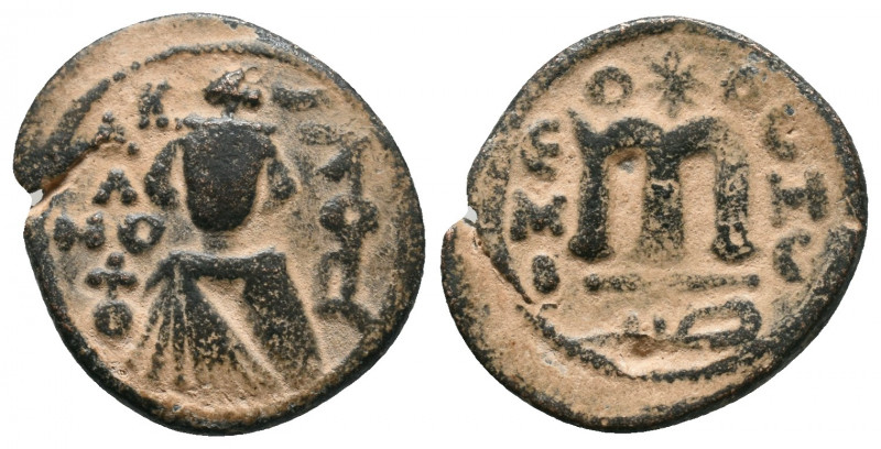 Umayyads, Arab-Byzantine Anonymous .
Abd al-Malik, 65-86 H./685-705 AD Follis
Ob...