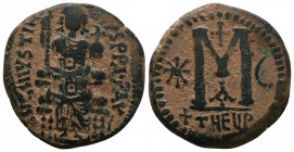 Justinian I. 527-565. Æ Follis . Theoupolis (Antioch) mint,. Struck circa 531-537. Justinian seated facing on throne, wearing crown with pendilia and ...