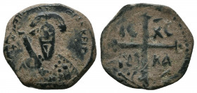 CRUSADERS, Antioch. Tancred. Regent, 1101-1112. Æ Follis . Second Type. Bust of Tancred facing, wearing turban and holding sword / Cross pommetée; fle...