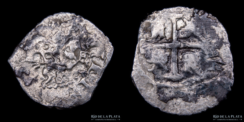 Potosí. Felipe IV. 1/2 Real 1658 E. Macuquina. AG.930; 14mm; 0.53g. CJ 27.6
Est...
