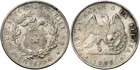1856/5. Chile. (Santiago). 1 peso. (Kr. 129). 24,90 g. AG. Golpecito en canto. Buen ejemplar. Rara. MBC+.