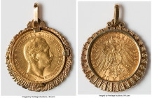 Prussia. Wilhelm II gold 20 Mark 1910-J XF (Mounted in Bezel), Hamburg mint, KM521. 20 mark coin mounted in looped unmarked gold bezel. Total diameter...