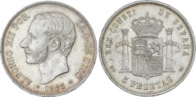 Alfonso XII
5 Pesetas. 1885 (*18-86). M.S.-M. (Golpecitos). EBC.