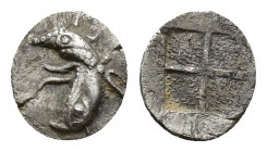 Ionia. Teos circa 500-475 BC. Tetartemorion AR (6.6mm., 0,1g). Head of griffin right / Quadripartite incuse square.