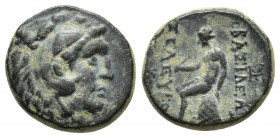 Kings of Syria. Seleukos II Kallinikos AE Sardes 246-225 BC. (16.6mm, 4.3g )Head of Herakles right, wearing lion skin headdress / Apollo Delphios seat...
