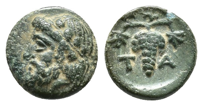 Aiolis, Temnos Æ 10.2mm, 1g Circa 3rd century BC. Bearded head of Dionysos to le...