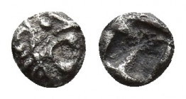 ASIA MINOR, Uncertain mint. Circa 500-450 BC. AR Tetartemorion (4.2mm, 0.1 g). Roaring lion head right / Incuse square punch.