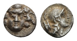 Pisidia. Selge circa 350-300 BC. Obol AR 9.2mm., 0.93 g. Facing gorgoneion / Helmeted head of Athena right; astragalos to left.