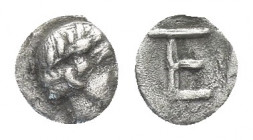 Ionia, Kolophon AR Tetartemorion. c. 450-410. (5.2mm, 0.2 g) Laureate head of Apollo r. / TE monogram within incuse square.