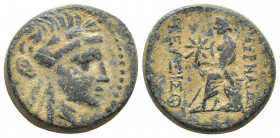 IONIA, Smyrna. Circa 75-50 BC. Æ (21.6mm, 21.6 g ). uncertain magistrate. Laureate head of Apollo right / The poet Homer seated left, holding scroll; ...