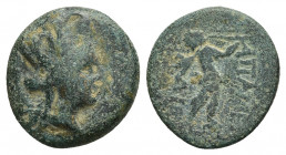 PHRYGIA. Apameia AE Ca. 88-48 BC. (15.2mm, 3.46 g) Bust of Tyche right. Obv: AΠAME Nude Marsyas striding to right on meander pattern, playing double-f...