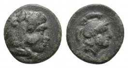 Mysia, Pergamon, c. 310-282 BC. Æ (9.9mm, 0.7g). Head of Herakles r., wearing lion skin. R/ Helmeted head of Athena r.
