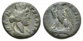 LYDIA, Tralles. Antoninus Pius c. 139-144. Æ (13.8mm, 2.7 g). TΡΑΛΙΑΝΩΝ turreted and draped bust of the Tyche, r. / ƐΠΙ ΠΟΠΛΙΟV eagle standing on bone...
