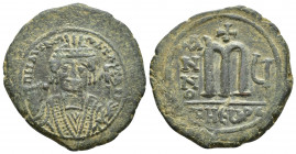 Tiberius II Constantine AD 578-582. Uncertain Regnal Year. Theoupolis (Antioch) Follis Æ (31.3mm., 11.7g) Blundered legend, crowned and cuirassed bust...