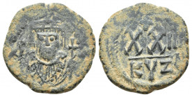 Phocas. 602-610. Æ Half Follis – 20 Nummi (21mm, 5.7 g). Cyzicus mint, 1st officina. Dated RY 2 (603/4). Crowned bust facing, wearing consular robes, ...