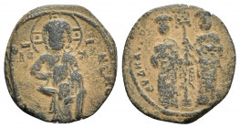 Constantine X Ducas and Eudocia AD 1059-1067. Constantinople Follis Æ (24.8 mm., 6.3 g) +EMMANOVHΛ; Christ standing facing on footstool, wearing nimbu...
