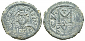 Heraclius. 610-641. Æ Follis (29mm, 11.6 g ). Cyzicus mint, 1st officina. Dated RY 2 (611/2). Helmeted and cuirassed bust facing, holding cross and sh...