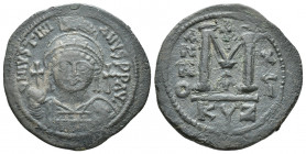 Justinian I AD 527-565. Dated RY 21= AD 547/8. Cyzicus Follis Æ (38.6mm., 18.9g) D N IVSTINIANVS P P AVG, helmeted and cuirassed bust facing, holding ...