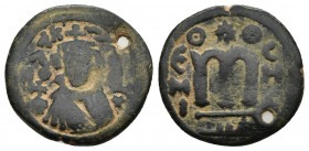 Arab-Byzantine, Umayyad Caliphate. AE follis 4.66 gr. 21.8mm. Hims (Emesa) mint. Facing Umayyad Imperial bust / EMI to left of M,birds eye on either s...