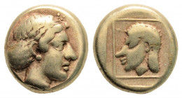 Greek 
LESBOS, Mytilene (Circa 412-378 BC)
EL Hekte (10.3mm, 2.45g)
Obv: Head of Artemis-Kybele right, with hair in sakkos.
Rev: Head of Telchine left...