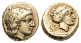 Greek
LESBOS, Mytilene (Circa 377-326 BC)
EL Hekte (10.5mm, 2.54g)
Obv: Laureate head of Apollo to right. 
ReV: Head of Artemis to right, her hair in ...