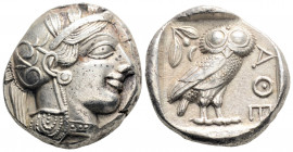 Greek
ATTICA. Athens. (Circa 449-404 BC)
AR Tetradrachm (24mm, 17.1g)
Obv: Head of Athena to right, wearing crested Attic helmet adorned with three ol...